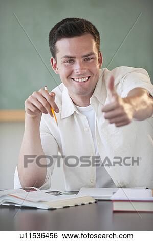 Stock Photograph - Male student smiling. Fotosearch