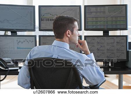 Male trader at work View Large Photo Image Stock Photograph - Male trader at work. Fotosearch