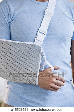 Man with arm in sling View Large Photo Image Stock Photograph - Man with arm in sling. Fotosearch