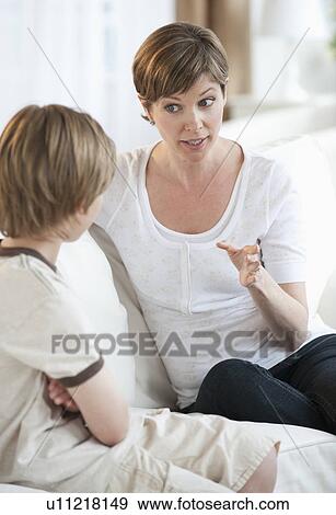 Stock Photo - Mother and child talking. Fotosearch