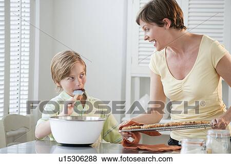 Stock Photo - Mother and chilld baking. Fotosearch