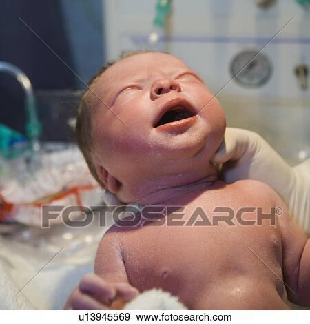 Newborn baby View Large Photo Image Stock Photo - Newborn baby. Fotosearch