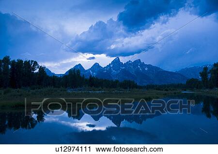 Scenic view of mountains View Large Photo Image Stock Image - Scenic view of mountains. Fotosearch