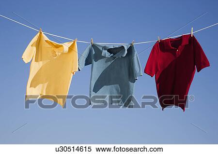 Stock Photography - Shirts on clothes line. Fotosearch