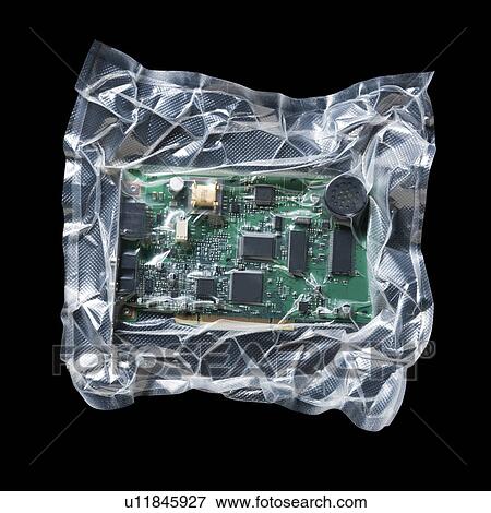Shrink wrapped circuit board View Large Photo Image Stock Photo - Shrink wrapped circuit board. Fotosearch