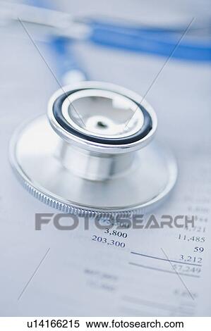 Stock Photography - Stethoscope on finance papers. Fotosearch