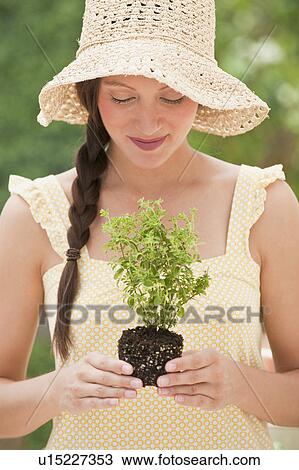 Woman gardening View Large Photo Image Stock Image - Woman gardening. Fotosearch