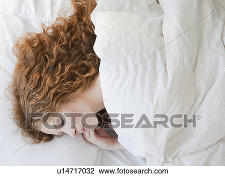 Woman in bed View Large Photo Image Stock Image - Woman in bed. Fotosearch