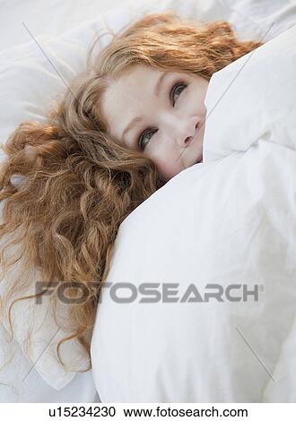 Woman in bed View Large Photo Image Stock Image - Woman in bed. Fotosearch