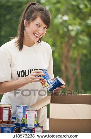 Woman volunteering View Large Photo Image Stock Photo - Woman volunteering. Fotosearch
