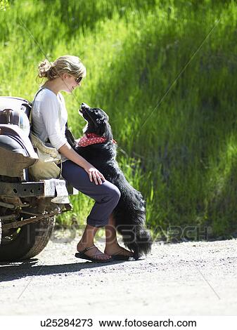Woman with dog View Large Photo Image Stock Image - Woman with dog. Fotosearch