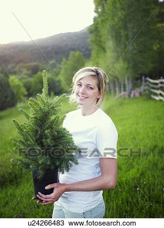 Woman working in garden View Large Photo Image Stock Image - Woman working in garden. Fotosearch