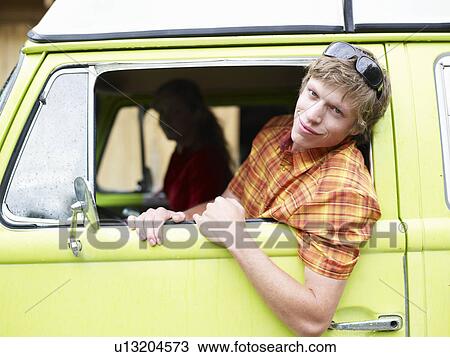 Stock Image - Young man in truck. Fotosearch