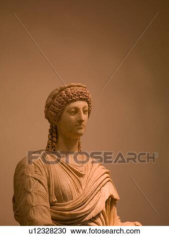 Stock Image - Ancient statue in Katakolon. Fotosearch