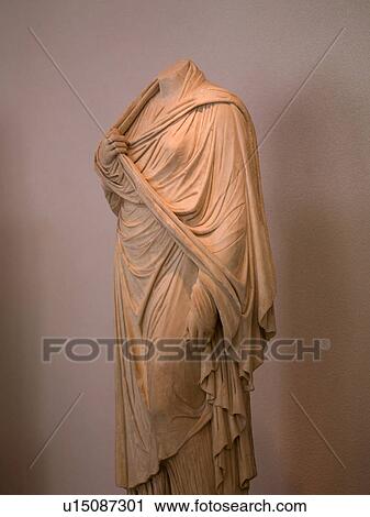 Stock Image - Ancient statue in Katakolon. Fotosearch