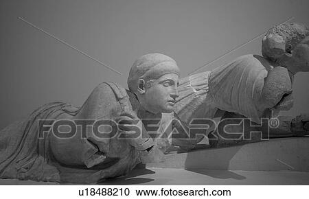 Stock Image - Ancient statue in Katakolon. Fotosearch