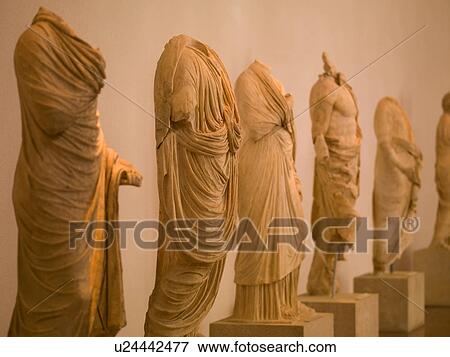 Stock Photo - Ancient statues in Katakolon. Fotosearch