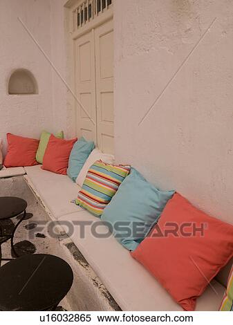 Stock Photography - Banquette with cushions in Mykonos Greece. Fotosearch