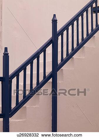 Stock Image - Blue railing on staircase in Mydonos Greece. Fotosearch