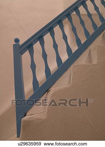 Stock Photo - Blue railing on staircase in Mydonos Greece. Fotosearch