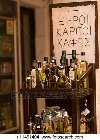 Bottles on a shelf in Corfu View Large Photo Image Picture - Bottles on a shelf in Corfu. Fotosearch