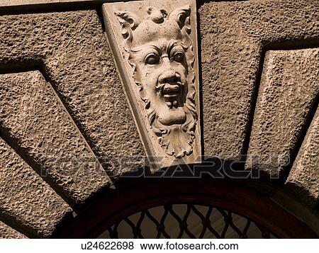 Carved face on entrance to Piazza del Popolo in Rome View Large Photo Image Stock Photo - Carved face on entrance to Piazza del Popolo in Rome. Fotosearch