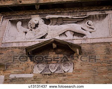 Carving of a winged lion in Venice View Large Photo Image Stock Photo - Carving of a winged lion in Venice. Fotosearch