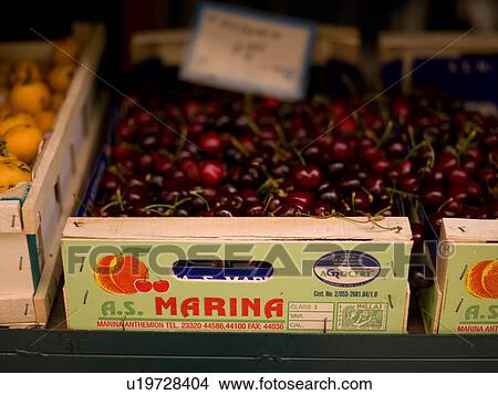 Picture - Cherries at an open market in Athens Greece. Fotosearch