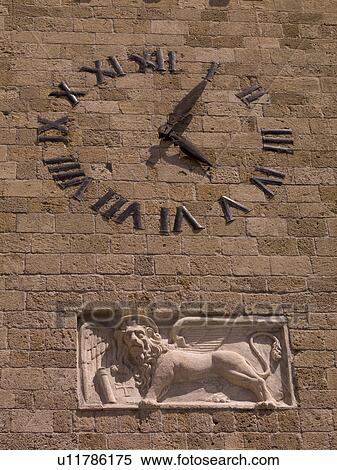 Clock on wall in Rhodes Greece View Large Photo Image Stock Photography - Clock on wall in Rhodes Greece. Fotosearch