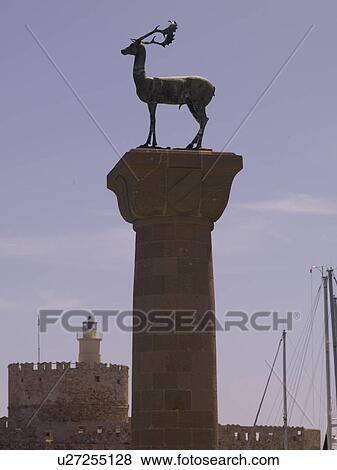 Stock Photo - Deer statue at Mandraki Harbour in Rhodes Greece. Fotosearch