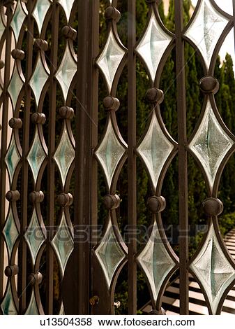 Diamond shape glass on a gate in Athens Greece View Large Photo Image Stock Photo - Diamond shape glass on a gate in Athens Greece. Fotosearch