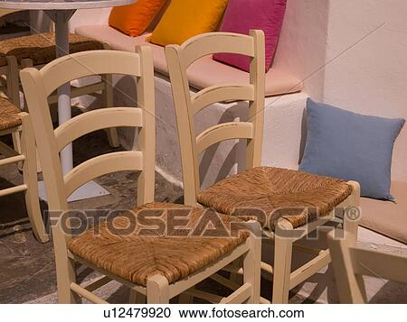 Empty chairs in Mykonos Greece View Large Photo Image Stock Image - Empty chairs in Mykonos Greece. Fotosearch