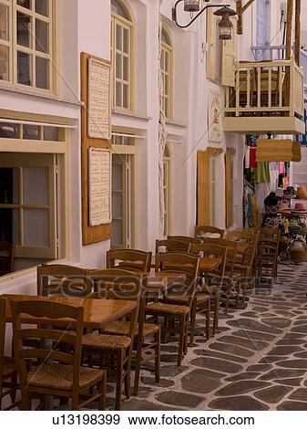Empty table and chairs in Mykonos Greece View Large Photo Image Stock Photo - Empty table and chairs in Mykonos Greece. Fotosearch