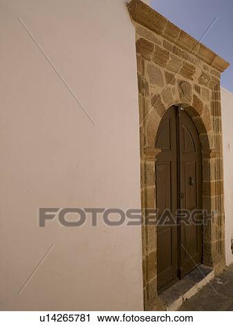 Stock Image - Exterior of buildings in Rhodes Greece. Fotosearch