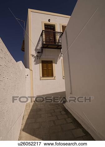 Stock Photo - Exterior of buildings in Rhodes Greece. Fotosearch