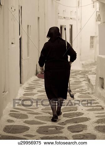 Stock Photography - Greek Woman in Mykonos Greece. Fotosearch
