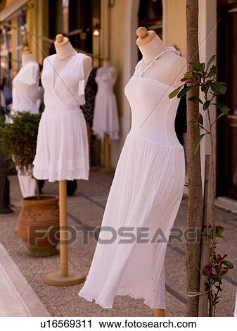 Stock Image - Mannequins outside shop in Katakolon. Fotosearch