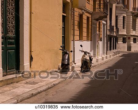 Stock Photography - Motorbikes on the street in Athens Greece. Fotosearch