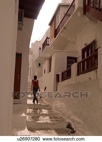 Stock Image - Narrow staired street in Mykonos Greece. Fotosearch