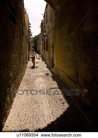Narrow street in Rhodes Greece View Large Photo Image Picture - Narrow street in Rhodes Greece. Fotosearch