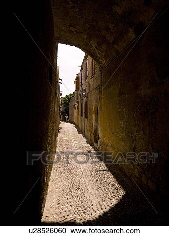 Narrow street in Rhodes Greece View Large Photo Image Stock Image - Narrow street in Rhodes Greece. Fotosearch