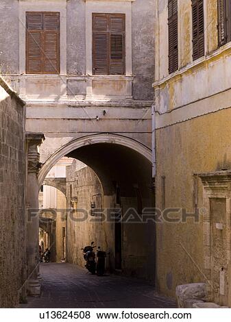 Narrow street in Rhodes Greece View Large Photo Image Stock Photo - Narrow street in Rhodes Greece. Fotosearch