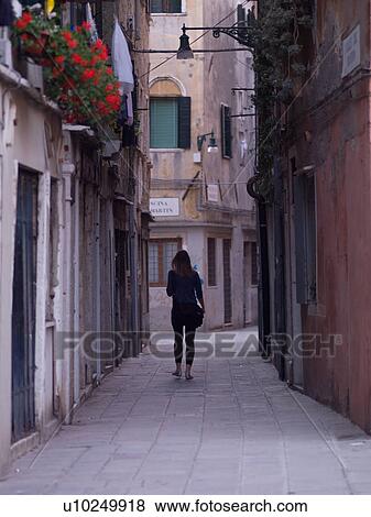 Stock Photo - Narrow street in Venice. Fotosearch