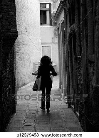 Stock Photo - Narrow street in Venice. Fotosearch