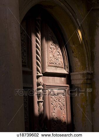 Stock Image - Shadows on a decorative door in Rhodes Greecw. Fotosearch