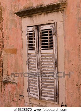 Stock Image - Shutters on exterior window in Dubrovnik. Fotosearch