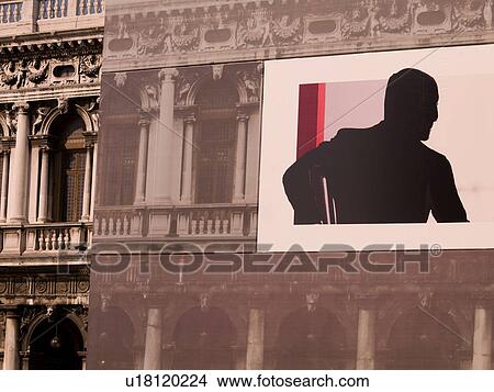 Silhouette of a man on a poster in Venice View Large Photo Image Picture - Silhouette of a man on a poster in Venice. Fotosearch