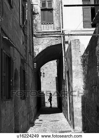Stock Photo - Silhouette of woman in Rhodes Greece. Fotosearch