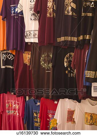Stock Image - Souvenir shirts in Rhodes Greece. Fotosearch
