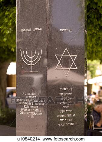 Star of David and Menorah on monument in Rhodes Greece View Large Photo Image Picture - Star of David and Menorah on monument in Rhodes Greece. Fotosearch